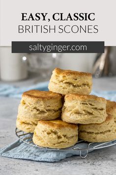 biscuits stacked on top of each other with text overlay that reads easy, classic british scones