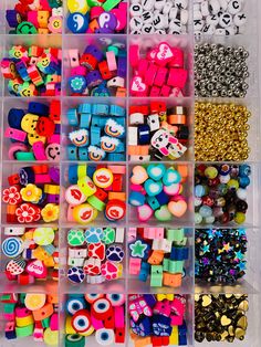 a plastic container filled with lots of different types of beads