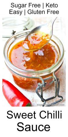 sweet chili sauce in a glass jar with a spoon