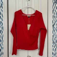 Brand New With Tags! Universal Threads Women’s Red Ribbed Wrap Top Size Large Comes From Smoke Free Home Stretch Ribbed Red Top, Stretch Red Ribbed Top, Red Ribbed Casual Top, Red Ribbed Long Sleeve Tops, Casual Red Ribbed Top, Red Ribbed V-neck Top, Fitted Ribbed Red Tops, Universal Thread, Wrap Top