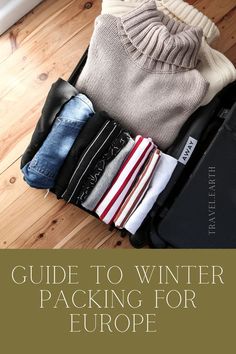 an open suitcase with clothes in it and the words guide to winter packing for europe