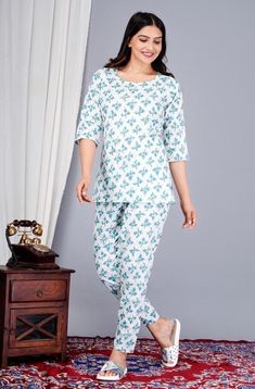 Name: "Women's White Cotton Printed Night Suit Top and Pyjama Co-ord Sets" Sizes: M (Top Bust Size: 38 in, Top Length Size: 29 in, Bottom Waist Size: 27 in, Bottom Length Size: 39 in)  L (Top Bust Size: 40 in, Top Length Size: 29 in, Bottom Waist Size: 28 in, Bottom Length Size: 39 in)  XL (Top Bust Size: 42 in, Top Length Size: 29 in, Bottom Waist Size: 29 in, Bottom Length Size: 39 in)  XXL (Top Bust Size: 44 in, Top Length Size: 29 in, Bottom Waist Size: 30 in, Bottom Length Size: 39 in)  Fre White Printed Loungewear Sets, White Printed Sets For Daywear, Cotton Pant Set For Loungewear, Shalwar Suit, Pyjama Sets, Night Suit, Womens Pyjama Sets, Pajama Robe, Floral Print Tops