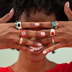 Make a bold statement with the Hazel Oval Stone with Enamel Band Ring. This cocktail ring features an oval-shaped semi-precious stone, such as Black Onyx, Red Jade, Green Onyx, Rainbow Moonstone, or other colors, surrounded by an enamel band. It adds a touch of sophistication and elegance to any outfit. Size 7. --DETAILS-- Handmade by skilled artisans in India Hypoallergenic nickel + lead-free brass hardware These accessories are made by human hands. A slight variation in size and color is consi Funky Rings, Red Blush, Red Jade, Light Blue Green, Enamel Ring, Rings Cool, Oval Stone, Green Onyx, Enamel Jewelry