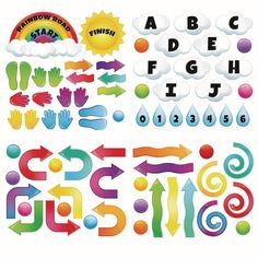 an assortment of different shapes and sizes of letters, numbers, and arrows for children to play with