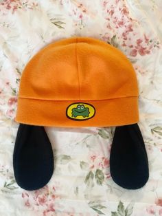 A soft, fleece beanie made to resemble Parappa's from Parappa the Rapper ! (*' The hat and ears are made entirely of fleece, and the logo is printable fabric paper. These hats are one size fits most! The band at the bottom measures about 24 inches all around, so if you need your hat to be bigger or smaller than that, please write it in your order notes. There are also options for a hat with no ears, or for one with squeakers in the ears ! If you would like your hat in a color other than the stan Parrapa The Rapper, Rapper Hat, Parappa The Rapper, Printable Fabric, Silly Clothes, Fleece Beanie, Funky Hats, Palm City, Swaggy Outfits