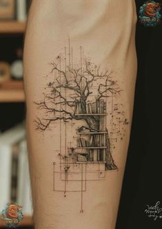 a tree with bookshelves on it is shown in this tattoo design by person