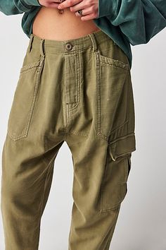 Just as comfy as they are effortless to style, these slouchy pants are featured in a low-rise, cargo-inspired silhouette with utility pockets throughout for added dimension. * Button fly closure * Oversized pouch pockets * Harem-inspired dropped crotch | Bay To Breakers Pants by Free People in Green, Size: S Utility Parachute Pants With Hip Pockets And Tapered Leg, Versatile Green Cargo Pants With Pockets, Khaki Tapered Leg Cargo Jeans With Hip Pockets, Khaki Cargo Jeans With Hip Pockets And Tapered Leg, Versatile Parachute Pants With Cargo Pockets, Versatile Tapered Leg Parachute Pants With Cargo Pockets, Utility Parachute Pants With Tapered Leg, Utility Parachute Pants With Patch Pockets And Tapered Leg, Versatile Tapered Leg Cargo Pants With Patch Pockets