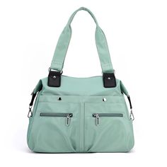 PRICES MAY VARY. WATER RESISTANT FABRIC:This tote bags is made of premium nylon fabric that is soft ,light and easy to wipe clean. Smooth zipper closure; detailed streamlined stitching and polyester lining. LARGE & LIGHT: The handbag purse is 14.57"(L) x 5.12"(W) x10.63"(H). Height of Handle: 10.63''. Weight: 0.93lbs. Roomy space to hold daily essential such as Ipad, A4 magazine, phone, keys, wallet, water bottle, snack, umbrella. SUPER PRACTICAL: 1 x main pocket, 1 x inner zipper pocket, 2 x in Green China, Mom Travel, Mummy Bag, Nylon Shoulder Bag, Nursing Baby, Travel Handbags, Weekend Bag, Baby Diaper, Side Bags