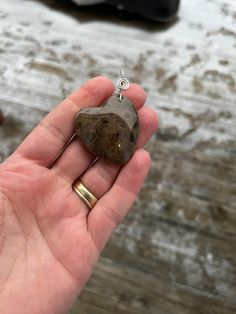 This beautiful genuine Petoskey Stone pendant is a stand alone piece, add a simple Sterling Silver wire wrap and it's stunning! If you've never seen a polished Petoskey stone, they are nothing like you've ever seen!  Our pendants are completely natural, nothing has been added to these stones to give them the shine they have!  All of our stones are shaped freehand, which means we do not use a stencil or anything when shaping(or sometimes leave them in their natural shape This is why all of our pendants are not identical which also makes them extremely unique!  This listing is for the pictured pendant. You may purchase this pendant alone, with a sterling silver chain, black wire choker, or black adjustable leather necklace.  Our stones have been hand polished to the point that light reflects Petoskey Stone, Jamais Vu, Rapid City, Sterling Silver Wire Wrap, Wire Wrapped Earrings, Black Jewelry, Stone Heart, Natural Shapes, Stone Pendant