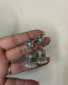 The prettiest jhumkas that too under 1000 pkr is a steal deal🤑🫶🏻 Dm or visit link in bio gor order placements and price enquiries Ornate Wedding Jhumkas, Traditional Metal Jhumkas For Wedding, Bohemian Drop Jhumkas In Metal, Bohemian Oxidized Jhumkas For Gift, Ornate Metal Jhumkas For Gifts, Indian Wedding Jewelry