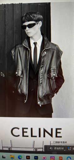 a black and white photo of a mannequin wearing a leather jacket with sunglasses