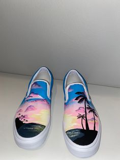 Hand-painted custom slip on vans Brand new Vans! Price includes shipping viaUS Priority Mail and shoe price (slip-on vans are currently $50) - I can do this design or message me to discuss another design - Made to order - every shoe is unique! - Painted with acrylic paint - Primed and finished with profesional-grade materials - Comes with a coat of waterproofing spray - Due to customization, sales are final so please double check your shoe size! Have a radiant day! Hand Painted Slip-on Casual Sneakers, Casual Hand Painted Slip-on Custom Sneakers, Casual Custom Artwork Slip-on Sneakers, Casual Hand Painted Slip-on Sneakers, Summer Slip-on Custom Sneakers With Rubber Sole, Custom Painted Shoes Vans, Custom Slip On Vans, Painted Vans, Slip On Vans