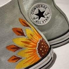 Customized, High Top Chuck Taylor’s These Beautiful Converse High Tops In A Light Blue With Customized Embroidery Of A Sunflower On Each Shoe. Never Worn. See Photos. No Box Or Tags, But 100% Awesome. * I Do My Very Best To Make Sure There Are No Imperfections. If There Are, I Will List Them. I Want My Buyers To Be Happy! However, Sometimes Things Do Slip By. Embroidered Yellow Converse, Acrylic Painted Shoes, Cross Stitch Converse, Embroiderd Converse, Casual Sneakers With Multicolor Embroidery And Appliques, Casual High-top Sneakers With Embroidered Graphics, Casual Sneakers With Custom Embroidery, Casual Sneakers With Custom Embroidery For Spring, Casual Sneakers With Multicolor Embroidery And Round Toe