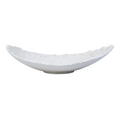 a white bowl filled with rice on top of a table