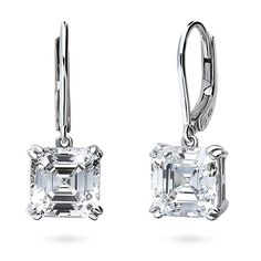 These solitaire dangle earrings offer luxurious sophistication that effortlessly elevates any look. Crafted with sterling silver, rhodium plated, stamped 925, nickel free. Set with premium quality 6 carat total (3 carat per stone, 8mm) asscher cubic zirconia in 4-prong setting. Earrings measure 0.8" in length, 0.3" in width. Leverbacks. Jewelry Education, Grade 6, Asscher Cut, Leverback Earrings, Inspired Jewelry, Accessories Jewelry Earrings, 3 Carat, Cz Stone, Cleaning Jewelry