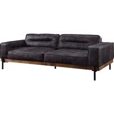 a black leather couch sitting on top of a wooden frame