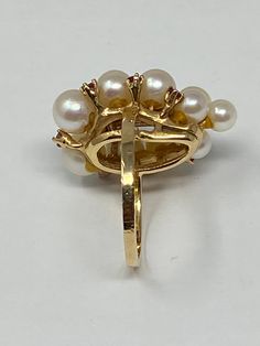 "Vintage Estate 14K Yellow Gold Pearl and Ruby Gemstone Ring. Size 7 Stamped 14K, with other unidentified marks. This ring has been professionally appraised for $2400.00 and that written appraisal will accompany the ring when sold. Since I am not an expert regarding this item, I have relied on the expertise of the certified professional appraisal. The following details about this gold pearl and ruby ring are from a Certified Gemmologist-Certified Goldsmith appraisal: \"One ladies yellow gold -pe Classic White Multi-stone Cluster Ring, White 14k Oval Pearl Ring, Formal White Multi-stone Pearl Ring, Yellow Gold Multi-stone Round Pearl Ring, Yellow Gold Multi-stone Pearl Ring, White Pear-shaped Cluster Ring For Formal Occasions, Pear-shaped White Cluster Ring For Formal Occasions, Classic Multi-stone Pearl Ring For Formal Occasions, Vintage Multi-stone Pearl Ring For Formal Occasions