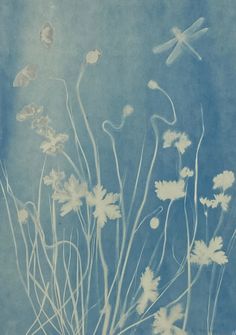 a painting of flowers and dragonflies on a blue background