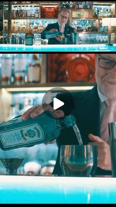 a man pouring drinks into glasses at a bar