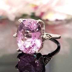 10.50 Carat Natural Kunzite & Diamonds 14k Solid Gold Ring  Ring Material: 14k Solid Gold  Total Metal Weight: 4.9 Grams  Gemstone: Natural Kunzite Gemstone Color: Delicate Light Pink Gemstone Shape: Oval Gemstone Dimensions:  15.00x11.00 mm Gemstone Carat Weight: 10.40 Carat Gemstone Quantity: 1 Diamonds: Natural Round Shaped  Diamonds Quantity: 4 Diamonds Total Carat Weight: 0.10 Carat Total Carat Weight: 10.50 Carat Ring Quantity: One  Ring Condition: New Made in the USA Delivered in an elega Classic Morganite Diamond Ring For Formal Occasions, Exquisite Formal Morganite Ring, Heirloom Morganite Diamond Ring For Formal Occasions, Classic Pink Gemstones For Formal Occasions, Formal Morganite Diamond Ring With Vvs Clarity, Classic Cushion Cut Gemstone For Anniversary, Pink Gemstones With Prong Setting For Formal Occasions, Morganite Ring With Prong Setting For Formal Occasions, Formal Morganite Rings With Prong Setting