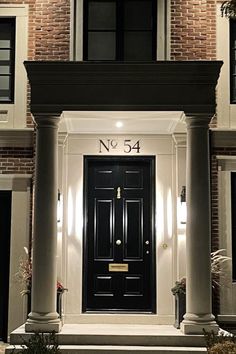 a black door with the number 54 on it