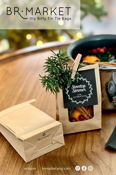 an assortment of fruits and vegetables on a wooden table with a bag for the market