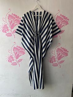 "BohoRobes Stripe Cotton Gown, Long Kaftan Dress, Beach Cover Up, Cotton Maxi Dress, Soft Cotton Sleepwear, Bridesmaid Gift Size - Free Size Length - 44/ 48/ 52 Inches Bust/chest size - 120 CM/ 48 Inches Fabric - 100% Cotton Pattern - Stripe Print Kaftan has Adjustable Drawstring Waist to loose or tight , Kaftan has V Shape Neck Which is 8\" Inches Deep. Kaftan Is Multi-purpose and can be worn as a cover up at the Beach ,Lounge wear ,sleepwear ,Pregnant Women Hospital Gown for Newly Moms ,Maxi Dress ,Free Dress etc . This kaftan, made from incredibly soft and lightweight cotton, is versatile for many occasions. Perfect for a swimsuit cover up on the beach or by the pool, with shorts and a tank top or over a summer dress. Can be also worn with a glam belt for a more dressed up look for lunc V-neck Kaftan Dress For Beach, Cotton Lined Maxi Dress For Vacation, Striped Cotton Maxi Dress For Vacation, Striped Cotton Beach Dress, Striped Lined Beach Dresses, Striped Long Dress For Vacation, Long Striped Vacation Dress, Bohemian Striped Tunic Dress, Striped Lined Maxi Dress For Beach