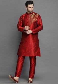 Art Silk Kurta in Maroon. This Readymade attire is Enhanced with Buttons. Crafted in Chinese Collar Neck and Full Sleeve. Available with an Art Silk Churidar in Maroon.Do note: Footwear shown in the image is for presentation purposes only. Half to one inch may vary in measurement. (Slight variation in actual color vs. image is possible). We sell all kinds of menswear. Mens Kurta | Mens Kurta Pajama | Mens Sherwani | Mens Sherwani Sets | Traditional Menswear | Partywear Menswear | Indian Mens Dre Red Art Silk Straight Kurta, Red Art Silk Kurta For Navratri, Red Art Silk Kurta For Transitional Season, Art Silk Kurta For Puja, Red Dabka Sherwani For Navratri, Bollywood Style Art Silk Kurta For Puja, Art Silk Kurta For Puja Festivals, Festival Art Silk Kurta For Puja, Festival Puja Art Silk Kurta