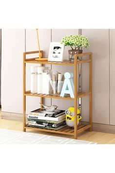 a wooden shelf with books and magazines on it