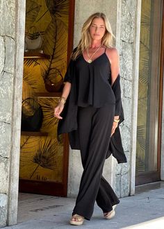 Mandy Pant Black (double Chiffon) The Mandy Pant is an essential piece in your LaRue wardrobe, offering both comfort and versatility. It can effortlessly transition from a casual to a formal look, making it the perfect choice for any occasion. Create a stylish outfit by pairing it with your preferred top and one of our signature kaftans. Drawstring waist Straight relaxed leg 100% Washed Chiffon Lining 100% Chiffon Hand Wash or Delicate Cycle and Hang Dry The print is an original Ramona La Rue ha Chic Evening Pants In Viscose, Chic Black Viscose Pants, Elegant Black Viscose Pants, Elegant Flowy Bottoms For Day Out, Elegant Rayon Bottoms For Day Out, Summer Black Viscose Pants, Black Viscose Summer Pants, Chic Rayon Bottoms For Night Out, Black Viscose Pants For Summer