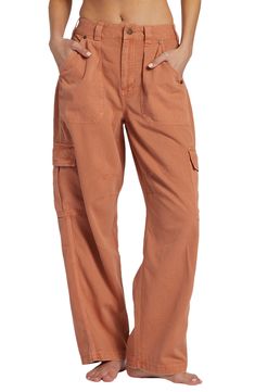 March to a utilitarian beat in these cargo pants cut from crisp cotton with a on-trend wide legs and plenty of pockets for all your daily essentials. 28" inseam; 18" leg opening; 12" front rise; 14" back rise (size 29) Zip fly with button closure Front slant pockets; back flap-patch pockets; cargo flap-patch pockets 100% cotton Machine wash, tumble dry Imported Cargo Pants Women High Waisted, Colorful Cargo Pants, Rust Colored Pants, Best Hiking Pants, Thrift List, Wide Leg Cargo Pants, Billabong Women, Thrift Shop, Utility Pants