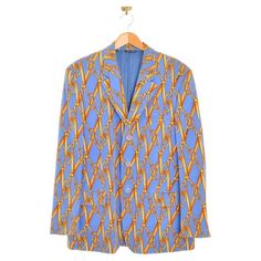 Rare 1997 Runway, Vintage Moschino 'Cheap & Chic' Archival velvet scissor print suit jacket, in a Sky Blue and Gold Colour way. MADE IN ITALY ! (We also have the matching pants available to purchase from our store separately) Features: Central line button fasten Fully lined Chest pocket Interior pockets Hip pockets 100% Cotton Velvet Sizing given in Inches: Pit to Pit: 22'' Pit to Cuff: 18'' Nape to Hem: 32'' Recommended Size: Large Fantastic Condition Velvet Suit Jacket, Runway Vintage, Franco Moschino, Vintage Moschino, Velvet Suit, Moschino Cheap And Chic, A Sky, Gold Velvet, Gold Colour