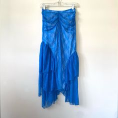 Urban Outfitters Uo Cj Lace Ruffle Midi Skirt In Blue. Body-Skimming Mid Rise Fit. Ruffle Detailing On The Sides. Ruching At The Waistband. Size Xs. New With Tags. Material: 84% Nylon 16% Spandex , Lining- 100% Polyester Waist: 24 Inches Approx Length: 30 Inches Approx Tags Ruched Skirt Asymmetrical Skirt Lace Midi Skirt Uneven 80s Look Colorful Boho Bohemian Blue Asymmetrical Maxi Skirt For Party, Elegant Blue Maxi Skirt With Ruffles, Elegant Blue Ruffled Maxi Skirt, Spring Long Skirt From Urban Outfitters, Urban Outfitters Long Lined Skirt, Urban Outfitters Long Skirt For Spring, Blue Flowy Maxi Skirt With Ruffles, Fitted Long Skirt From Urban Outfitters, Blue Fitted Skirt With Ruffles