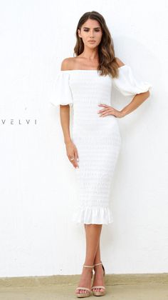 The Skyla Shirred Midi Dress in White by Velvi is a simple and elegant style that you'll feel your best in! Adding a hint of drama with the puff lantern sleeve detail and a shirred body style makes it the perfect wear-all-day style. White Midi dress Shirred body Pull-on style; no zipper required Trendy lantern sleeve Elasticised cuff on sleeve to keep their shape Elegant puff sleeves - can be worn on the shoulder or off the shoulder Can be worn on or off shoulder Ruffle detailing Slim fitting Go Dress Gender Reveal, Gender Reveal Dress, Shower Dress, Bachelorette Party Dress, Midi Dress Elegant, Dress Rehearsal, Bachelorette Dress, Champagne Dress, Rehearsal Dinner Dresses