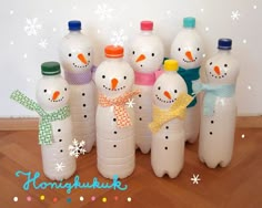 there are many plastic bottles with snowmen on them