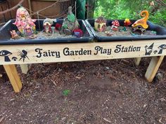 a garden play station with fairy garden figurines