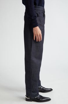 Articulated knee seams and multiple darts help shape the subtle barrel silhouette of these nonstretch-denim jeans finished with raw hems. 32" inseam; 17" leg opening; 11" front rise; 14" back rise (size 42EU) Zip fly with button closure Five-pocket style 100% cotton Dry clean Made in Italy Designer Clothing Denim Cropped Leg Pants With Seam Detailing, Dark Wash Cropped Leg Bottoms With Seam Detailing, Classic Rigid Denim Workwear Bottoms, Dark Wash Jeans With Seam Detailing For Work, Modern Jeans With Belt Loops And Standard Cut Leg, Modern Jeans With Belt Loops Standard Cut, Rigid Denim Cropped Bottoms For Work, Cropped Leg Rigid Denim Bottoms For Workwear, Classic Jeans With Contrast Stitching For Work