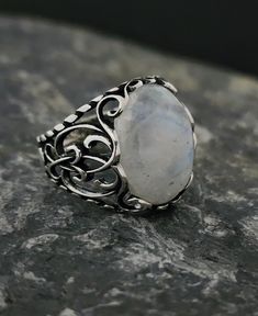 🌙💍 Introducing the enchanting Moon Stone Ring from RedFoxSilverCrafts! This mesmerizing piece of jewelry combines celestial beauty with exquisite craftsmanship. The ring showcases a captivating moonstone that radiates a mystical glow, reminiscent of the moon's ethereal light. ✨⭐ Crafted with precision and attention to detail, this ring is designed to capture the essence of elegance and grace. The moonstone symbolizes intuition, serenity, and feminine energy - making it an ideal accessory for t Moon Stone Ring, Ethereal Light, Stylish Rings, Men Ring, Size 10 Rings, Moonstone Ring, Feminine Energy, Moon Stone, Handmade Sterling Silver