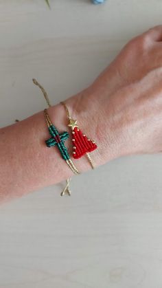 Makes a great gift! Macrame Christmas tree and Macrame cross bracelet are a nice Christmas gift, Valentine's day gift, birthday gift, wedding gift, bridesmaid gift and other special day gift for women. The price is for two bracelets. Looks great worn alone or multiple layered. Each tree and cross are made with in red or green color. The star on the top is 24K gold plated metal bead. Great fit for almost any wrist - adjusts from 15cm to 30cm approx. Please let me know if you want different colors. Handmade Adjustable Beaded Bracelets For Holidays, Adjustable Beaded Bracelets As Christmas Gift, Adjustable Beaded Bracelets For Christmas Gift, Adjustable Beaded Bracelet Christmas Gift, Adjustable Beaded Bracelets For Holiday Gifts, Handmade Adjustable Christmas Bracelets, Adjustable Christmas Friendship Bracelets, Christmas Friendship Adjustable Bracelets, Handmade Bracelets For Holiday Gifts