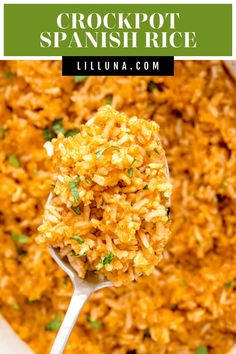 crockpot spanish rice in a white bowl with a spoon