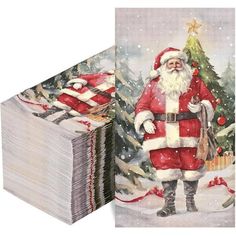 a stack of christmas cards with santa claus