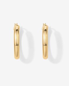 With an elongated sleek silhouette, these hoops are a must-have for the modern woman. Throw them on with a sundress in the summer, or turtleneck and updo in the winter, and look effortlessly chic. 925 Sterling Silver post14KT yellow, rose or white gold platedMeasurements: Width: 25mm (.98”); Height: 30mm (1.12”) Elegant Spring Hoop Earrings, Modern Summer Hoop Earrings, Elegant Everyday Spring Hoop Earrings, Chunky Jewelry, Toggle Bracelet, Beaded Anklets, Bracelet Collection, Chain Earrings, In The Winter