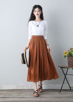 ★★ FEATURES Polyester fabric with lining no pockets Elastic waist skirt Plus size skirt Pleated skirt Orange skirt Perfect for Summer Wash by hand with cold water ★★Bespoke Order Service If you Request other color Request the length Your height is not between 155 cm- 175 cm Your weight is not between 47 kg -77 kg I can do it for you, It will need some extra fee depending on on your need. Contact with me for more detail. ★★ Warmly Note: 1 ) : Please confirm your shipping address! If you wish to s Summer Pleated Brown Skirt, Brown Flowy Pleated Skirt For Spring, Spring Brown Flowy Pleated Skirt, Casual Pleated Chiffon Skirt, Casual Long Chiffon Skirt, Flowy Long Skirt For Fall, Brown Pleated Maxi Skirt For Summer, Brown Full Maxi Skirt For Spring, Casual Chiffon Full Skirt