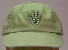 Lily of Valley May Flower of Month Hat - Embroidered Women Garden Cap - 24 Colors Available - Price Apparel Embroidery Lily Of Valley Flower, Flower Of Month, Embroidered Lily, Lily Of Valley, May Flower, Gardening Hat, How To Wash Hats, Garden Gift, Hat Embroidery