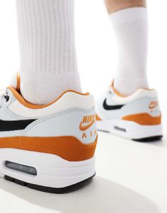 Nike Air Max 1 sneakers in white, gray and orange | ASOS Orange Sneakers With Boost Midsole For Light Sports, Orange Low-top Sneakers For Light Sports, Functional Orange Low-top Sneakers, Nike Orange Sneakers For Jogging, Functional Orange Sneakers For Streetwear, Dynamic Orange High-top Sneakers, Orange Dynamic Sneakers With Air Cushioning, Orange Sneakers For Jogging With Round Toe, Functional Orange Sneakers With Round Toe