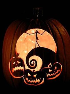 a carved pumpkin with jack o lantern on it