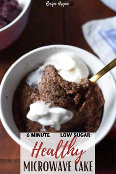 a close up of a bowl of food on a table with text overlay that reads 6 minute low sugar healthy microwave cake