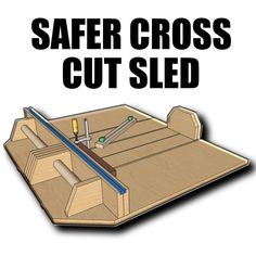 a wooden box with tools in it and the words safer cross cut sled above it