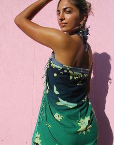 Vintage beach sarong in blue and green dolphin print. Tassles to edges. Multi use, wear as a sarong, beach cover up or use as a beach towel. Lightweight breathable fabric. Size: 44"(112cm) x 64"(163cm) Composition: Rayon Beachy Green Sarong For Beach Season, Green Tropical Sarong For Poolside, Green Beachy Sarong For Poolside, Tropical Green Sarong For Poolside, Green Tropical Print Sarong For Summer, Green Printed Beach Sarong, Green Cotton Swimwear For Beach, Green Bohemian Sarong For Poolside, Green Hawaiian Sarong For Beach Party