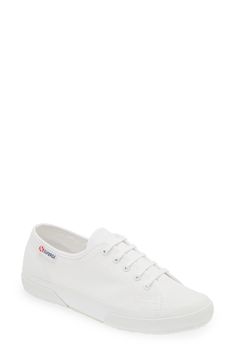 Bring tennis-inspired style to your wardrobe with this especially lightweight sneaker that boasts a cotton-canvas upper and a vulcanized-rubber sole. 1 3/4" heel; 1" platform Cushioned insole Textile upper and lining/rubber sole Imported Casual Everyday Sneakers With Waffle Outsoles, Everyday White Canvas Sneakers, Sporty Cotton Sneakers With White Sole, Classic Canvas Shoes With White Sole For Sports, Sporty Canvas Shoes For Spring Everyday Wear, Sporty Canvas Shoes For Everyday Spring Wear, Classic White-sole Canvas Shoes For Sports, Sporty Everyday Canvas Shoes For Spring, Classic Canvas Shoes For Sports